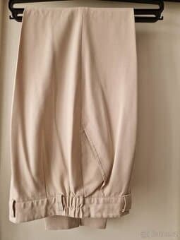 Nové dámské béž. kalhoty zn. Biaginni, vel 38