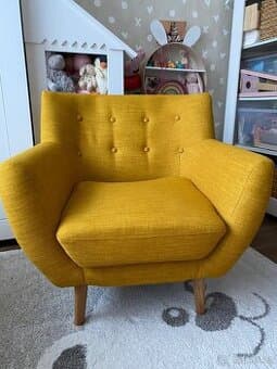 Krásné pohodlné žluté křeslo Monte House Nordic z Bonami