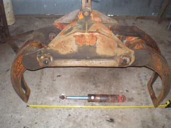 kleště na hydraulickou ruku na kulatinu