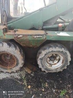 Smykový nakladač unc